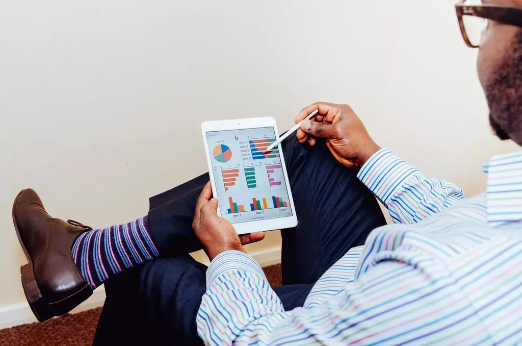 User viewing charts on a tablet